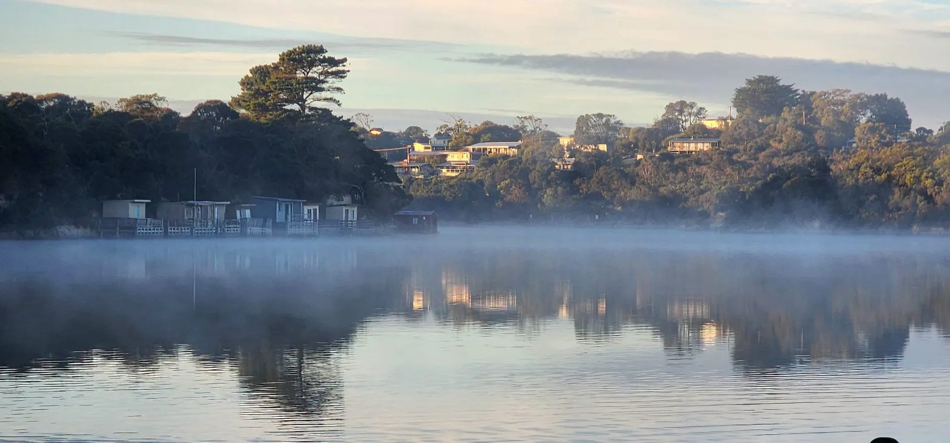 Morning mist lying across the Glenelg River above the Nelson boat sheds