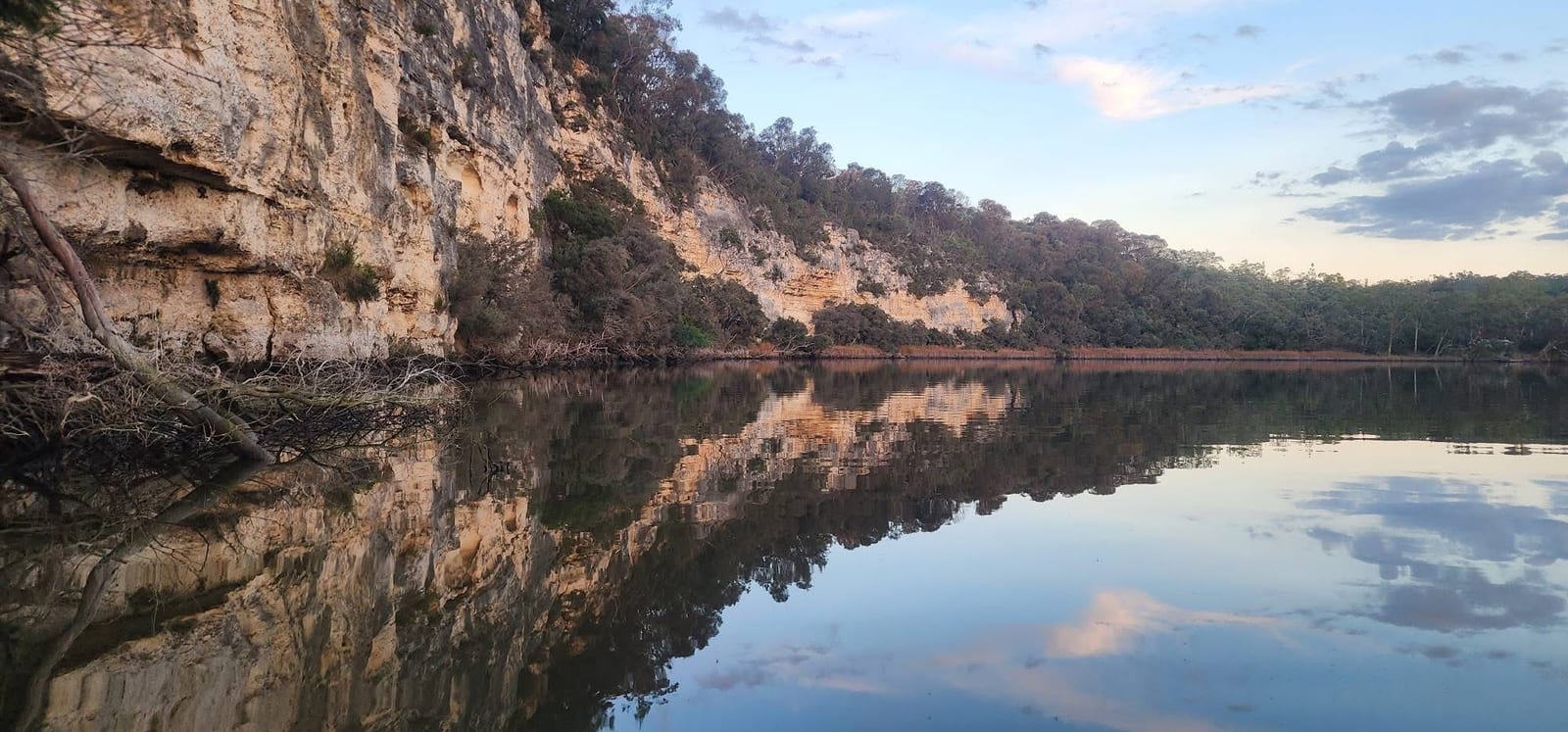Limestone cliffs of the Glenelg gorge mirrored in still water